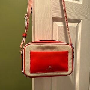 Michael Kors Crossbody handbag.  Comes with Wallet and matching card case.